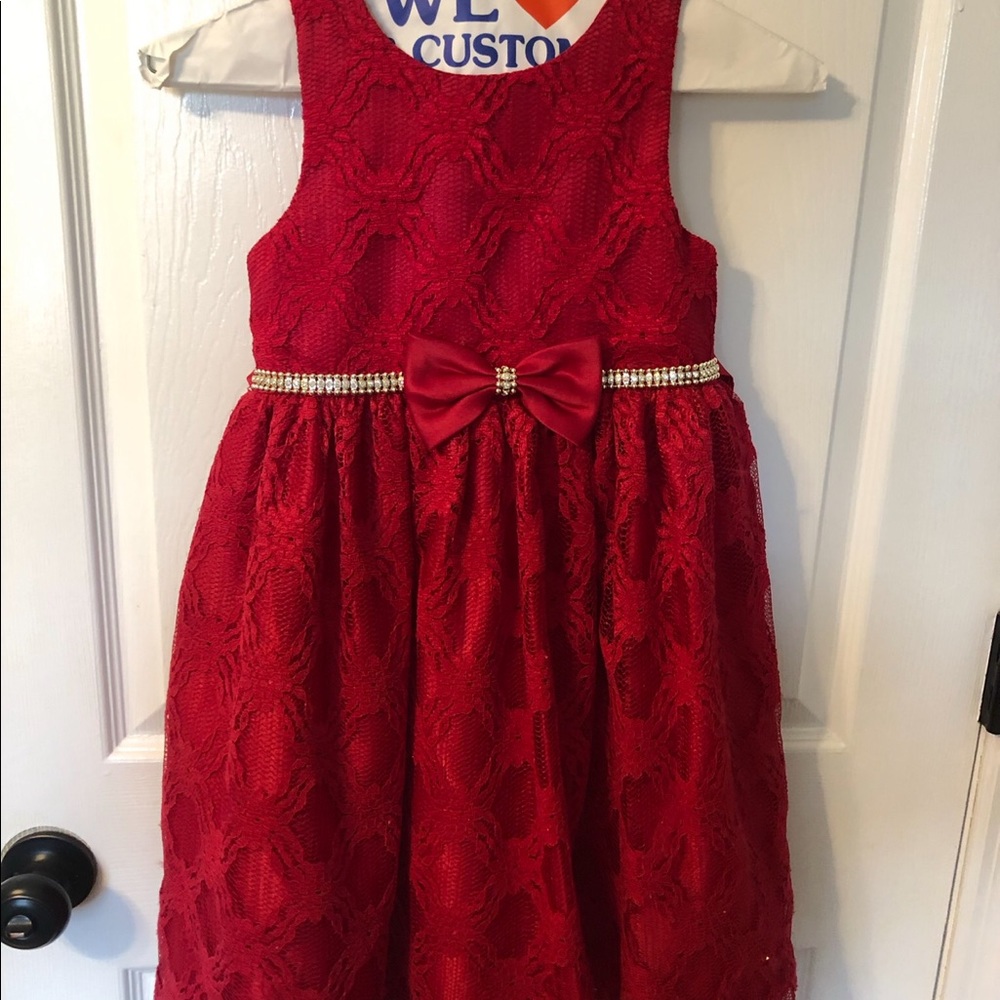 Red formal dress with bow and rhinestone belt for girls